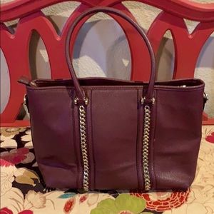 Burgundy purse with gold braided accent